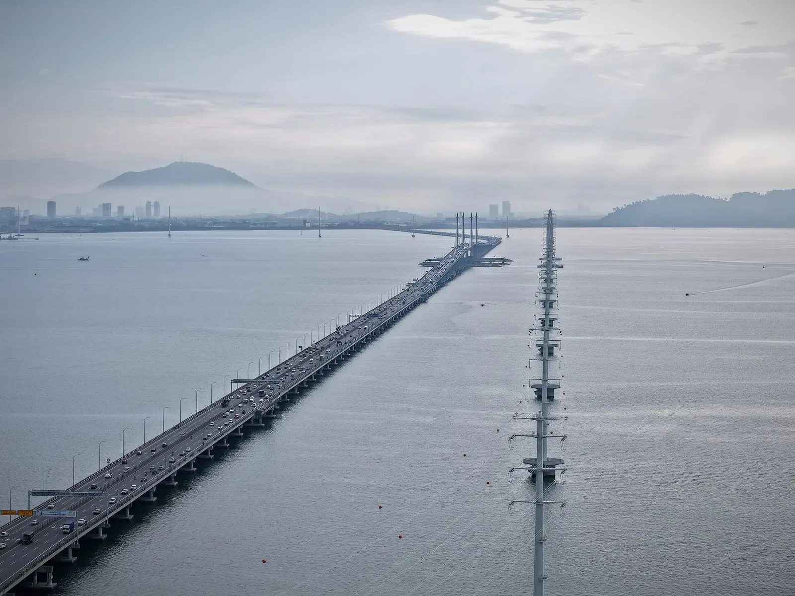 Aerial view of the Penang Bridge crossing the strait toward the mainland